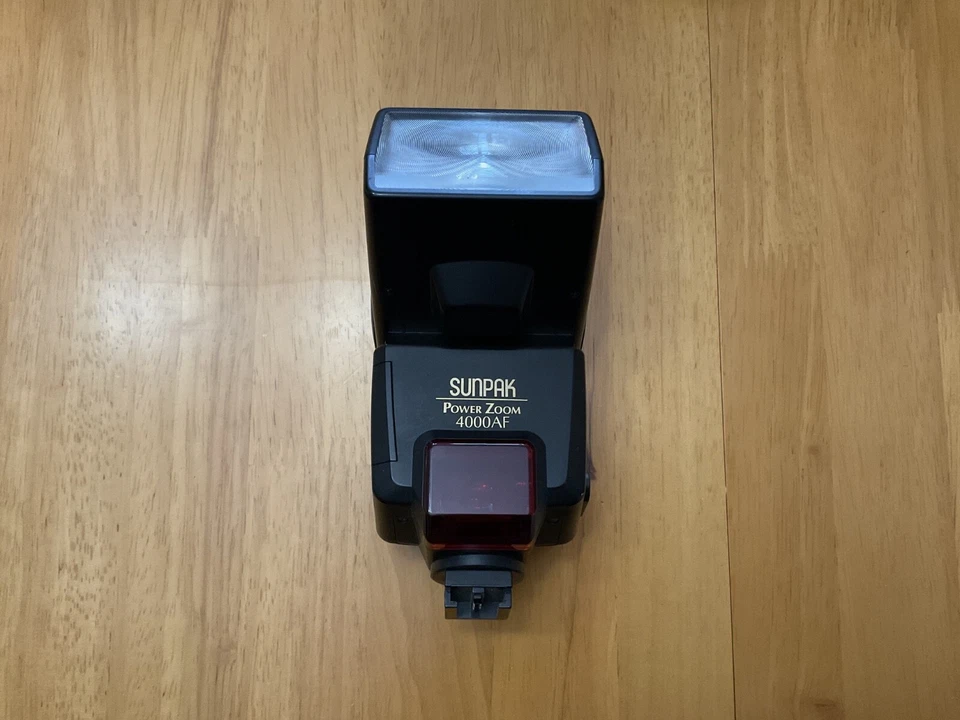 Flash electrónico SUNPAK Power Zoom PZ 4000AF 4000-AF en funcionamiento para Minolta Foto 1 de 1