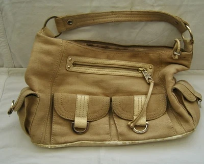 BOLSO DE MANO DE TELA 2º 1/2 SIGLO XX “THE SAK” con MÚLTIPLES COMPARTIMENTOS, EXTERIOR E INTERIOR Foto 1 de 4