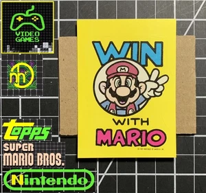 1989 Topps Nintendo Game Packs - Pegatina GT18 Gana con Mario - LIMPIO - Imagen 1 de 4