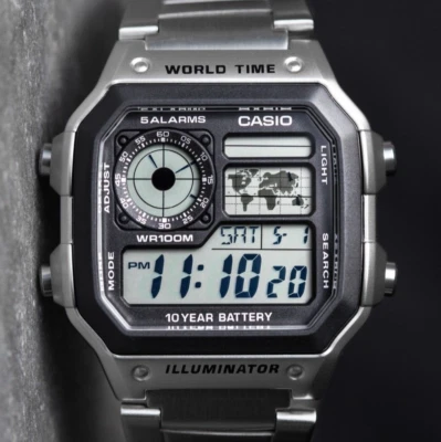 Reloj digital Casio Royale World Time de acero inoxidable para hombre AE-1200WHD-1AVEF Reino Unido Foto 1 de 2