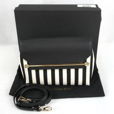 Bolso sin asas Strathberry informal estilista de lona a rayas con correa en negro - talla única Foto 1 de 4