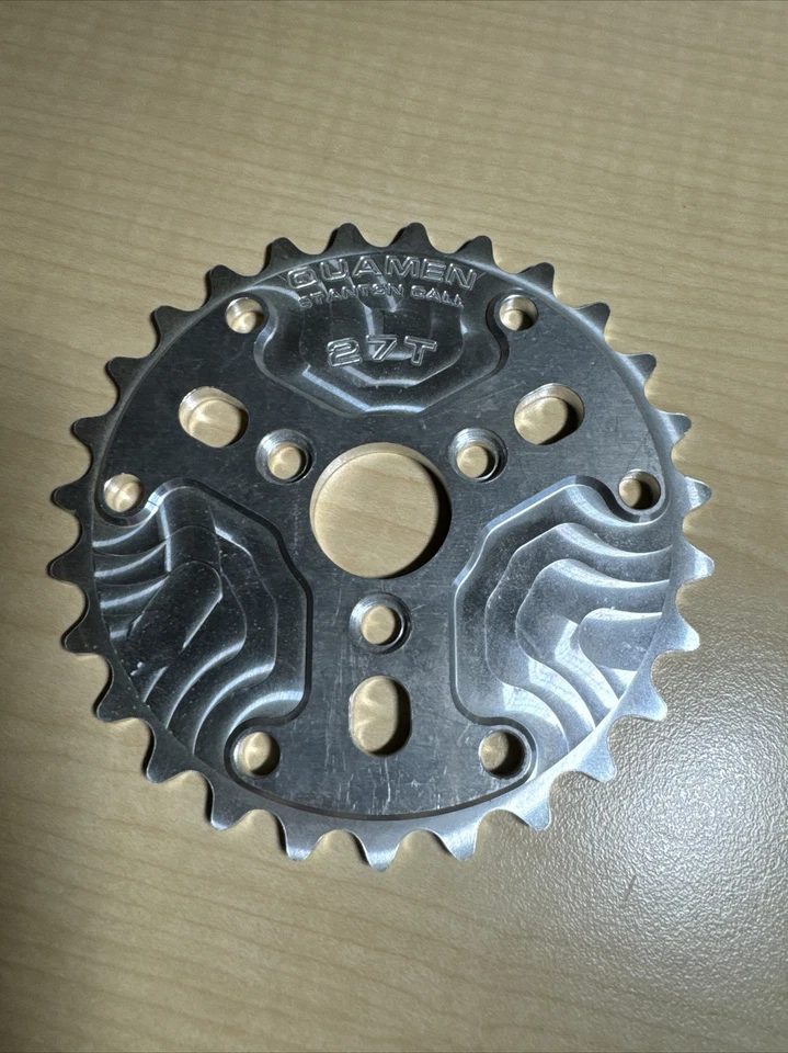 Piñón BMX Quamen 27 T Mid School Auténtico Aluminio EE. UU. Flatland Graveyard Foto 1 de 3