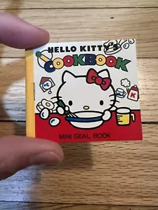 Libro de cocina de Sanrio Hello Kitty 1976 mini sello pegatina libro completo - Imagen 1 de 6