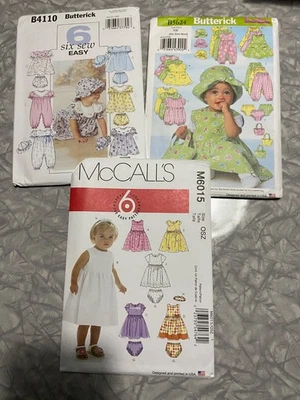 Sewing Patterns Lot of 3 Uncut Infants Dress Jumper Romper M6015 B5624 B4110 - Image 1 of 4