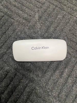 White Calvin Klein Hinged  Hardshell Eyeglass Case Black Inside - Image 1 of 4