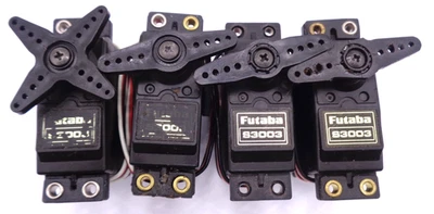 Futaba S3003 Servos quantity of 4 good condition  + horns & mounts working fine - Image 1 of 2