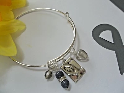 BRAZALETE BRAZALETE CONCIENCIA CÁNCER CEREBRAL O ENFERMEDAD DE PARKINSON  Foto 1 de 3