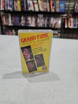 LIVE IN CONCERT - GRAND FUNK (CASSETTE) 🇺🇸 BUY 5 GET 5 FREE 📀 FREE SHIPPING  Foto 1 de 3
