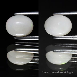 💎 1,28 quilates 8,8 x 7 mm cabujón ovalado ópalo blanco natural - destello arco iris, gema de Etiopía - Imagen 1 de 6