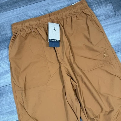 Calça Nike Air Jordan Essentials Masculina Nylon FV7306-228 Marrom Tamanho Médio Nova $90 - Imagem 1 de 4
