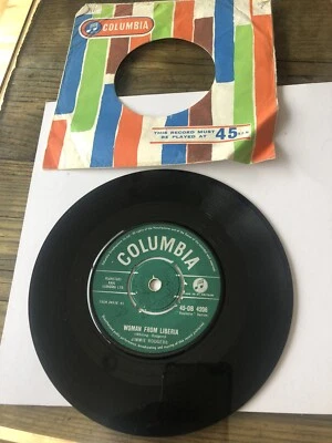 VINTAGE 1959 7" SINGLE 45 RPM RECORD WOMAN FROM LIBERIA JIMMIE RODGERS DB 4206 - Image 1 of 4