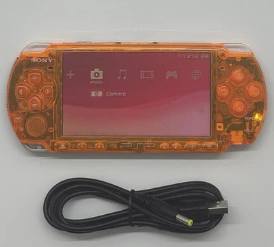 Sistema de Juego Portátil Sony Playstation PSP-3006 Naranja Funciona Pequeño Punto Oscuro Leer Foto 1 de 4