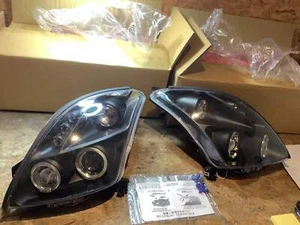 Tuning-Tec LED Angel Eyes Scheinwerfer für Suzuki Swift 05-10 schwarz - Bild 1 von 5