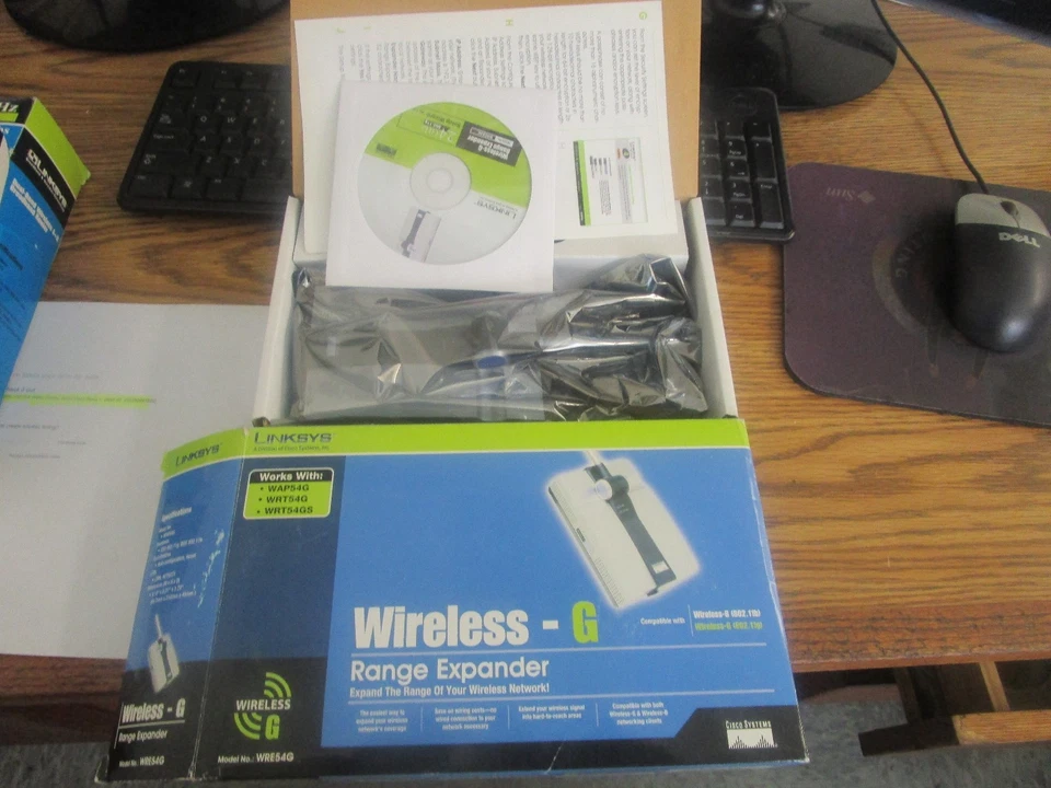 Linksys Modello: Wre54g senza Fili G Gamma Expander. Nuovo - Fondo di Magazzino - Immagine 1 di 1