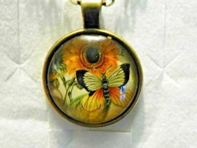 Collar Girasol/Mariposa en Cristal y Bronce con Cadena Adj 20 Pulgadas Foto 1 de 3