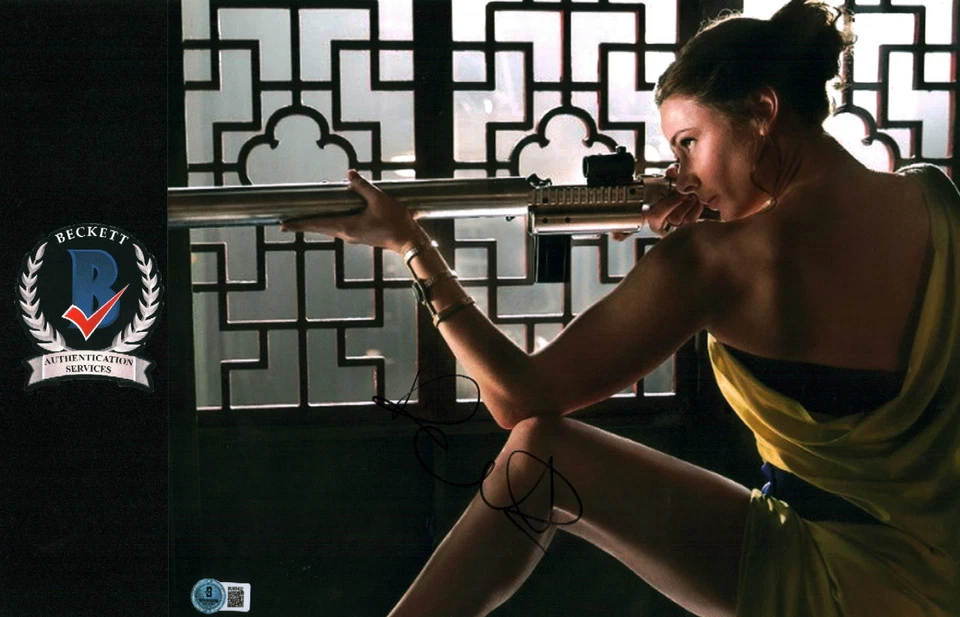 REBECCA FERGUSON SIGNED MISSION IMPOSSIBLE 11X14 PHOTO BECKETT BAS COA  - Image 1 of 1