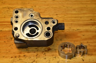 Bomba de carga de transmisión John Deere 455 AM878563 445 425 Foto 1 de 4