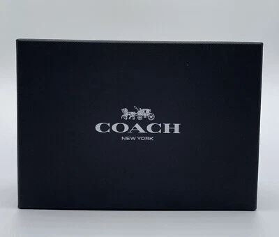 Conjunto de collar, pulsera y pendientes Coach Signature C en caja $295 Foto 1 de 4