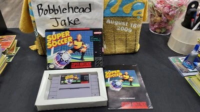 CIB SUPER SOCER SUPER NINTENDO SNES VIDEO GAME COMPLETE IN BOX W/ PROTECTOR CASE - Image 1 of 4