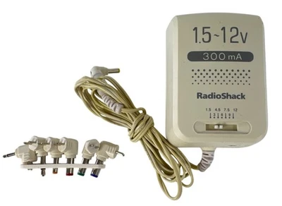 Cable de alimentación blanco RadioShack adaptador CA modelo 273-1662A, 1,5-12 V 300 mA de colección Foto 1 de 3