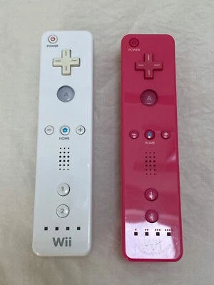 Japanese Nintendo Wii Motion Controllers Pink and White - Image 1 of 3
