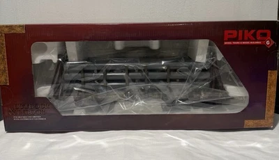 Piko G Scale AT & SF Bulkhead Flatcar with Pipe Load 38738 - Image 1 of 3