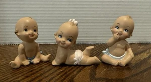 Vtg Kewpie Baby Girl Figurine lot of 3 Blue Eyes Pink Bow Bisque Porcelain - Picture 1 of 6
