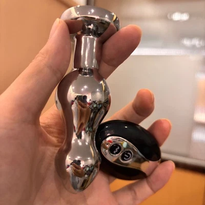 Consolador vibrador anal inalámbrico de metal masajeador de próstata juguete sexual mujeres hombres Foto 1 de 4