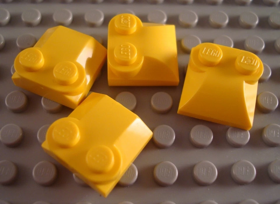 LEGO Lot of 4 Yellow 2x2 Curved Top Stud Engine Brick Parts - Image 1 of 1