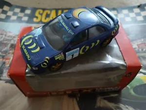 SCX Subaru Impreza "Safari" slot car - #83950.20;4-wd,lights,runner,box..... - Picture 1 of 5