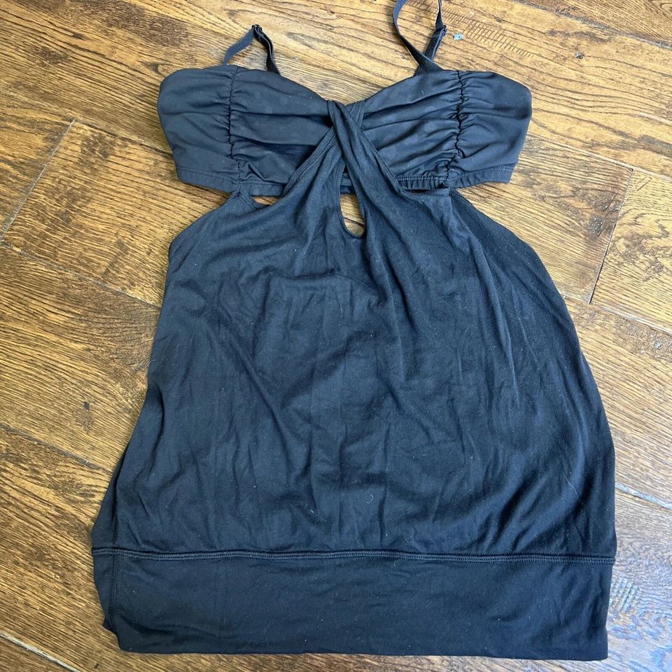 Top de entrenamiento para mujer LULULEMON negro recortes laterales talla 4 Foto 1 de 4