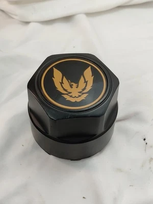PONTIAC FIREBIRD TRANS-AM Wheel Center Hub Cap Black w/ Gold Bronze Bird - Image 1 of 4
