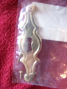 Llavero pequeño 8,2 x 2,5 cm curvo, latón? - Imagen 1 de 1