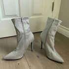 ASOS DESIGN Esmerelda high heeled sock boots in silver glitter