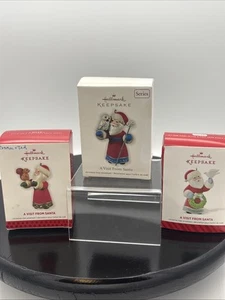 Lotto 3 ORNAMENTI NATALIZI RICORDO SEGNAPOSTO UNA VISITA DA BABBO NATALE 2013-14 CH25 - Foto 1 di 20