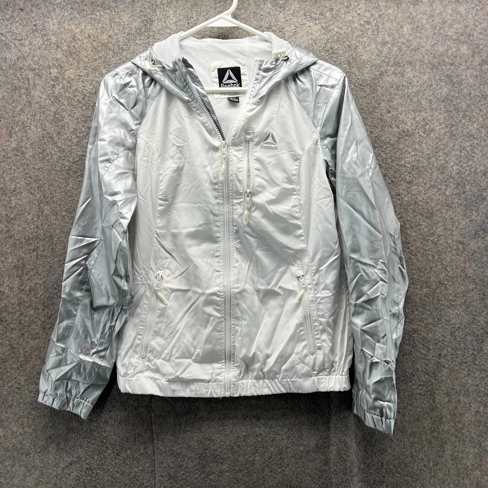 Chaqueta Reebok Mujer Pequeña Gris Cremallera Completa Rompevientos Con Capucha Abrigo de Lluvia Impermeable Foto 1 de 4
