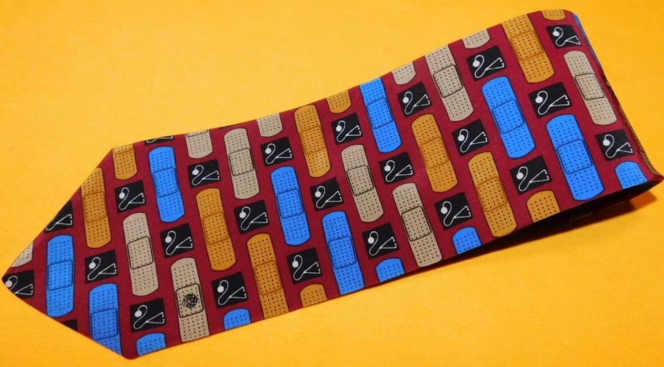 CORBATA VICKY DAVIS "OUCH" ROJO/AZUL/NARANJA MOTIVO VENDAJE - CORBATAS - CORBATAS DE DISEÑADOR. Foto 1 de 3