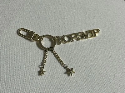 Llavero Michael Kors VIP dorado Foto 1 de 4