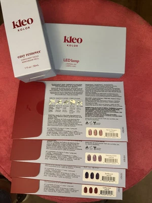 Juego de uñas Kleo 6 piezas removedor de lámpara 4 tiras café violeta secreto hechizado Foto 1 de 2