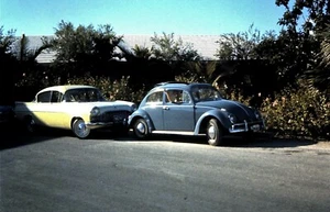 Orig Slide, 1963 - Two Vintage Classic Cars, Autos parked in Nassau / VW Beetle - Picture 1 of 1