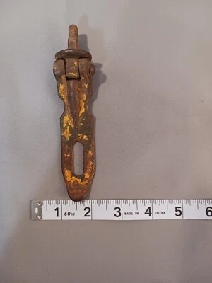 METAL VINTAGE DOOR LATCH HAS OLD YELLOW PAINT ON IT - Image 1 of 4