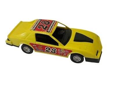 Vintage 80s STROMBECKER Chevy Camaro 28 PLASTIC Yellow Race car Sponsor Stickers - Image 1 of 4