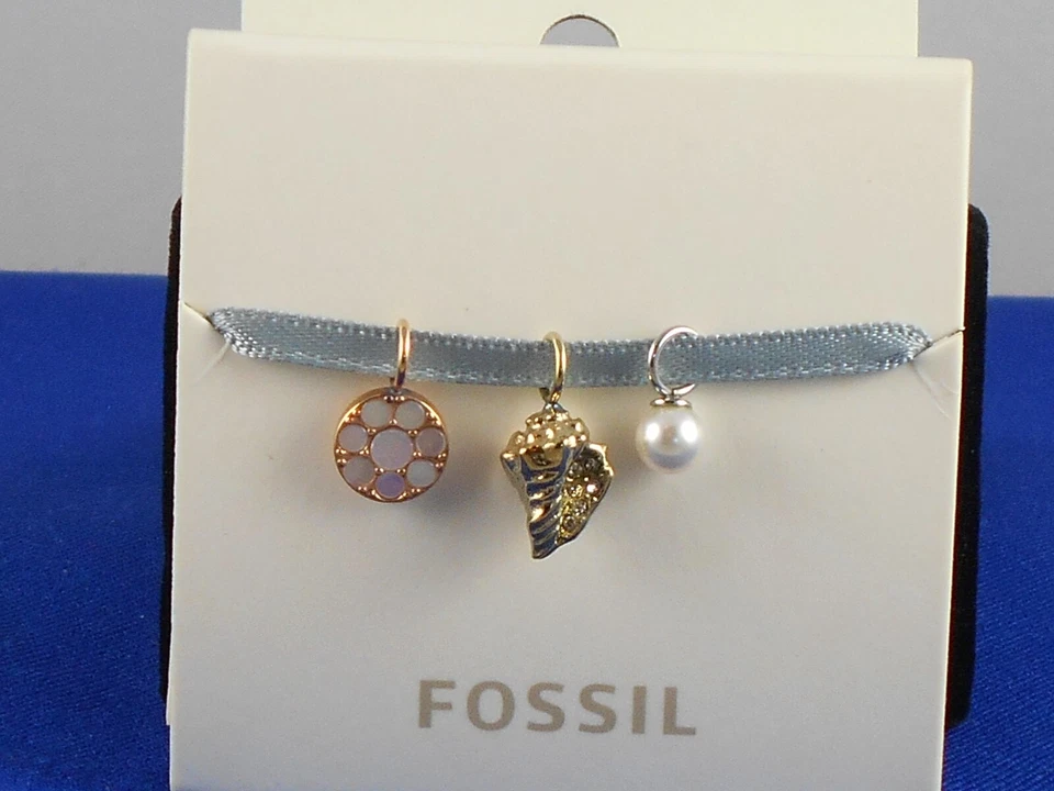 Conjunto de micro dijes pulsera flor madreperla con concha de metal mezclado marca Fossil Foto 1 de 1
