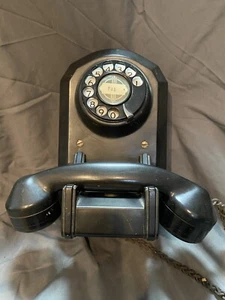 Teléfono de pared giratorio de baquelita eléctrico automático vintage con revestimiento trenzado - Imagen 1 de 12