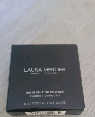 POLVO RESALTADOR LAURA MERCIER - BRILLO ROSA - 0,2 OZ Foto 1 de 3