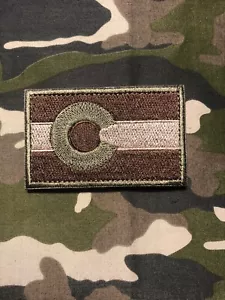 ¡PARCHE DE BANDERA DEL ESTADO COLORADO TÁCTICO SOMETIDO CON GANCHO TRASERO! COLORES CAMUFLAJE - Imagen 1 de 4