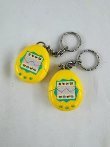 Vintage 1990s Mcdonald Tamagotchi Toy Keychains Set Of Two - Picture 1 of 3