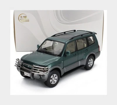 SUN-STAR 05831 MITSUBISHI - PAJERO 3.5L V6 V73 2006 - GREEN GREY - 1/18 - Immagine 1 di 2