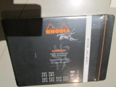 RHODIA TOUCH CARB'ON NOTEBOOK 112 black pgs, A5, hard cover, sealed - image 1 of 4
