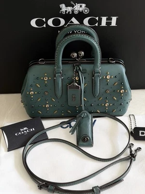 CARTERA KISSLOCK COACH 1941 VERDE AZULADO PRADERA REMACHES 21591 350 DE 612 Foto 1 de 4